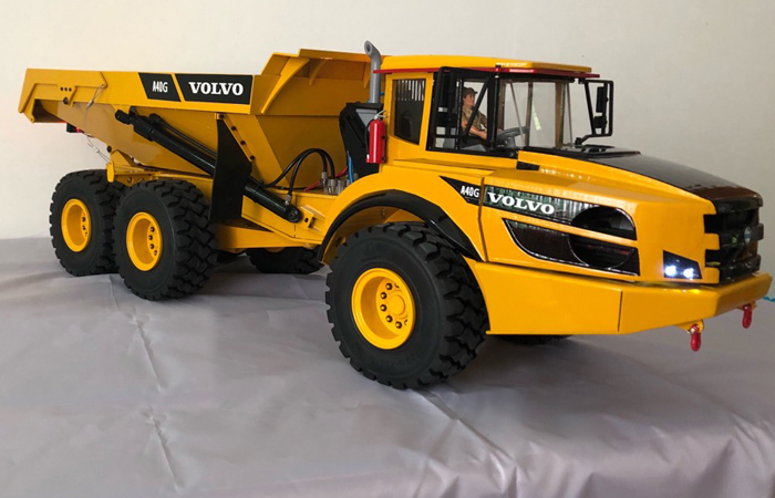 Hydraulic RC Articulated Hauler, Dump Truck ( roller skids heavy machine movers, construction equipment dealers, rc construction equipment).